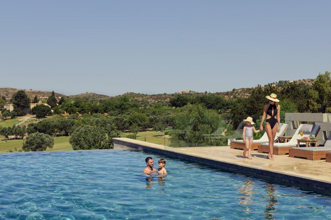 Minthis Resort Tsadha Exterior foto The pool at the hotel