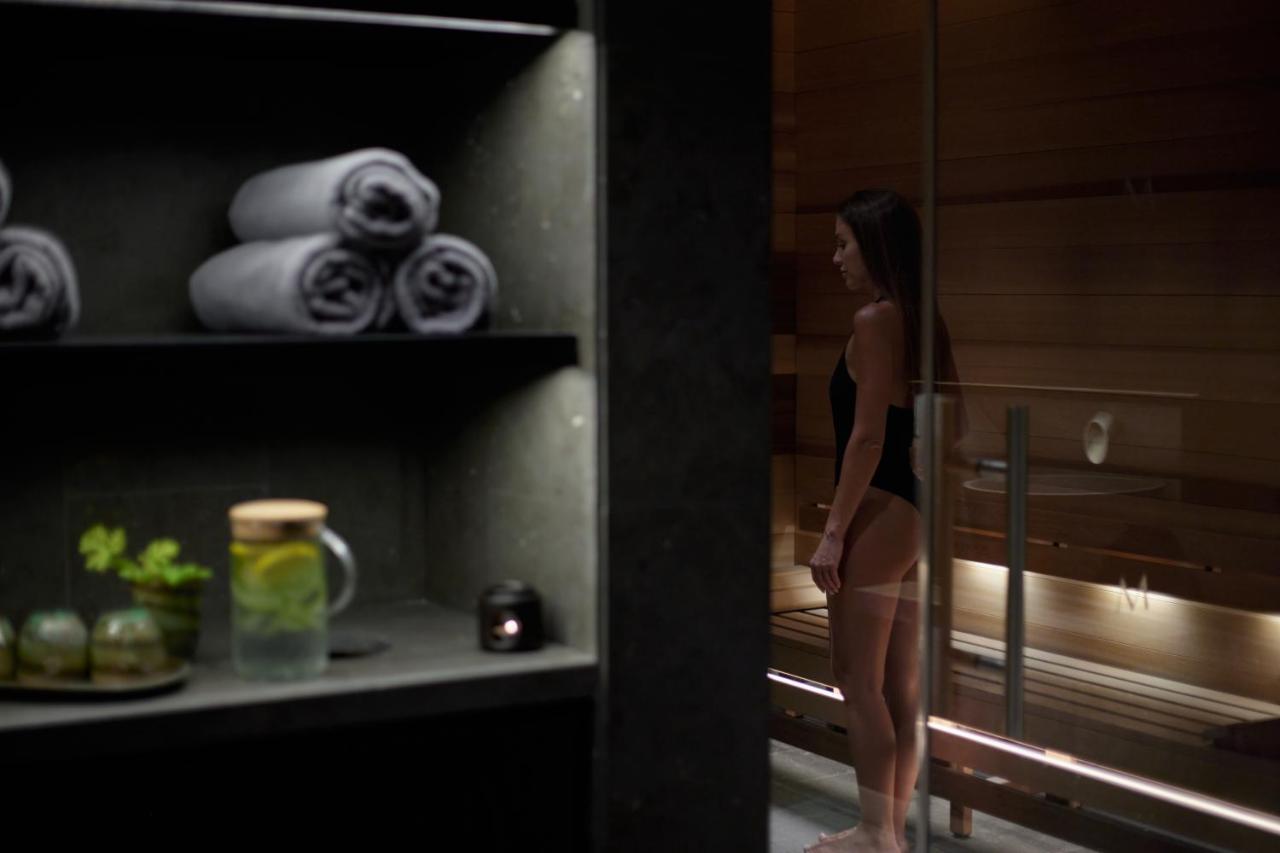 Minthis Resort Tsadha Exterior foto A woman in a sauna