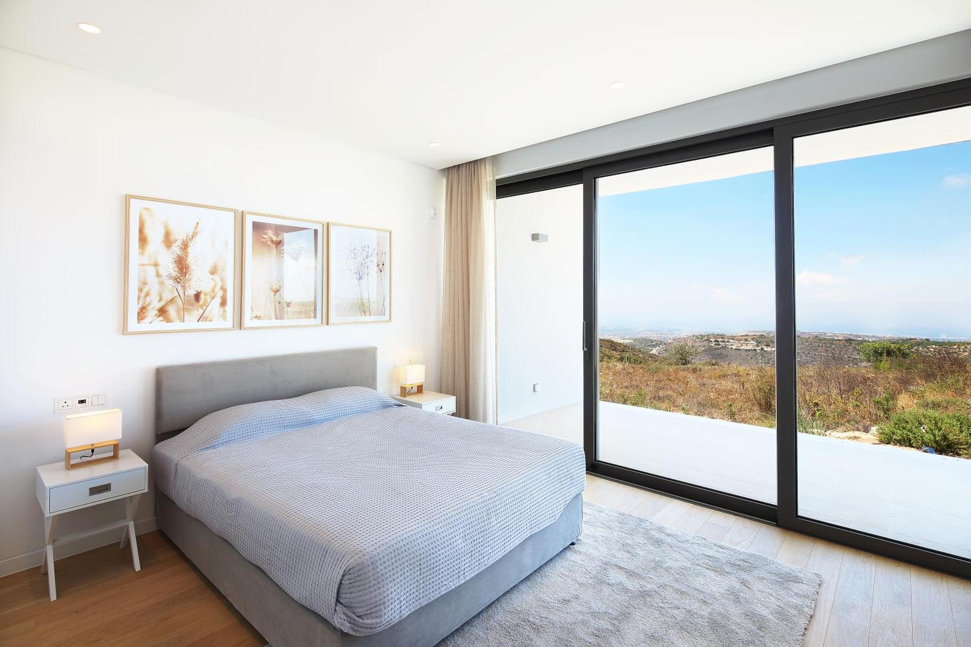 Minthis Resort Tsadha Exterior foto Bedroom with sliding doors